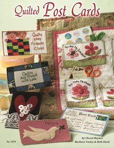 the cover of quilted post cards with pictures of flowers and hearts on them,