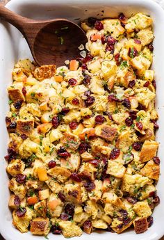 cranberry apple stuffing in a white casserole dish