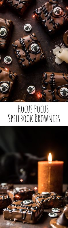 some cookies are sitting on a table with a lit candle in front of them and the words hoccus pocus spell book brownies