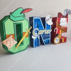 the letters are made out of cardboard and have different designs