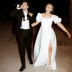 a man in a tuxedo and a woman in a white dress