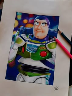 a drawing of buzz lightyear from toy story with colored pencils next to it