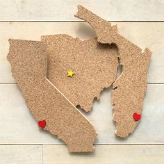 a piece of cork that has been cut out to look like the state of michigan