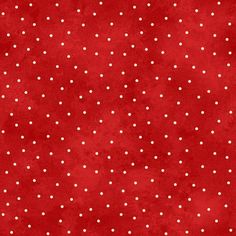 a red background with white polka dots