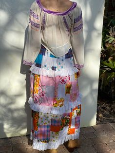 "late 1960's, early 1970's handmade patchwork maxi skirt. For the peasant blouse, go here: https://www.etsy.com/listing/1006044900/vintage-embroidered-peasant-blouse-pink?ref=shop_home_active_3 Waist: 26\" Hips: 40\" Length: 40\" Circa: late 1960's, early 1970's Condition: Good vintage condition. Normal wear. A few little rips to the waist band, otherwise normal wear throughout. Handmade with love :) Follow out IG for cool stuff---closetcasevintage instagram.com/closetcasevintage Please read our Hippie Patchwork Maxi Skirt, Vintage Long Skirt With Patchwork, Vintage Patchwork Tiered Skirt, Vintage Tiered Skirt With Patchwork, Vintage Tiered Patchwork Skirt, Vintage Patchwork Skirt For Festival, Vintage Patchwork Skirt, Blue Leather Skirt, Lace Cottagecore