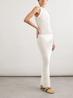 From the curve-hugging silhouette to the sheer construction, Alaïa's maxi dress beautifully showcases your figure. It's made from airy open-knit and has dimensional piping along the high neckline. Underpin yours with tonal underwear or a slip. Dress Flats, Sport Swimwear, Swimsuit Dress, Maxi Knit Dress, Open Knit, White Maxi Dresses, High Neckline, The High, Jeans Dress