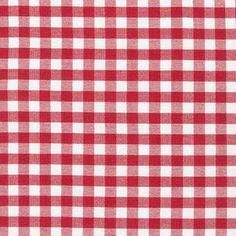 a red and white gingham checkered tablecloth with a ruler on the side