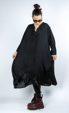 "Black Plus Size Loose Shirt, Extravagant Shirt, Black Long Viscose Shirt, Elegant Shirt Dress, Oversize Womens Shirt, Viscose Maxi Dress White Long Cotton Shirt is handmade. ▸FABRIC & CARE Viscose 100% High quality Viscose Hand Wash / Dry Cleaning Machine Cold Wash / 30 C Do Not Tumble Dry ▸SIZING This model is available in XS \\ S \\ M \\ L \\ XL \\ XXL \\ 3XL \\ 4XL Please take a look at the sizing charts before placing an order. Model is wearing size S. ▸SIZE CHART SIZE XS bust: around 3 Elegant Oversized Black Shirt, Black Blouse With Shirttail Hem For Daywear, Black Long Sleeve Blouse For Daywear, Black Long Sleeve Shirt Dress With Relaxed Fit, Black Relaxed Fit Long Sleeve Shirt Dress, Lagenlook Long Sleeve Blouse For Daywear, Elegant Black Long Sleeve Tunic, Elegant Long Sleeve Black Tunic, Black Buttoned Shirt For Daywear