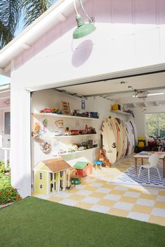 the inside of a garage with toys in it