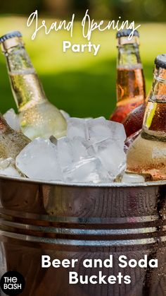 beer and soda buckets with the words grand opening party