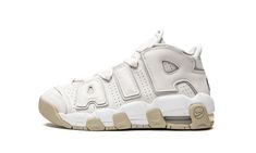 The Nike Air More Uptempo GS “Phantom” brings a classic basketball shoe back to the streets, this time in a colorway just for kids.  This sneaker arrives dressed in a Phantom, Light Iron Ore, White and Sanddrift color scheme, which all translates to a sneaker predominantly in off-white and tan tones.  This Air More Uptempo is constructed with a leather upper, and a visible Air Max unit in the heel completes the design. Beige Nike, Low Top Nikes, Nike Uptempo, Nike Air Uptempo, Nike Air More Uptempo, Nike Air More, Old Shoes, Basketball Sneakers, Nike Kids