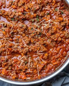 a large pot filled with meat and cheese