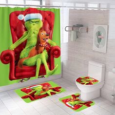 the grinch is sitting on the red chair in the bathroom