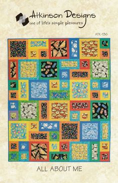 a colorful quilt with many different designs on it