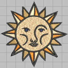 an embroidered sun and moon with blue eyes