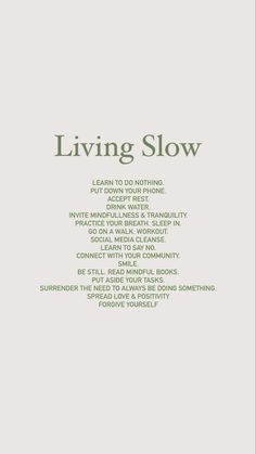 a poster with the words living slow written in green and black on it, against a white background