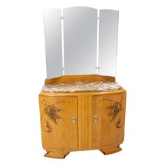 a wooden cabinet with mirrors on the top and drawers below it, against a white background