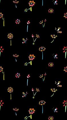 a black background with colorful flowers on it