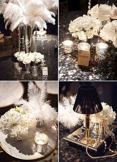 the table is decorated with white flowers and feathers