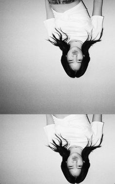 two pictures of a woman upside down in the air with her hair flying through the air