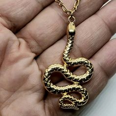 Gold Snake pendant, snake necklace , snake chain necklace, Snake jewelry, Animal necklace, 24k gold filled necklace, bohemian necklace gold Brass 24k plated snake pendant with Figaro stainless steel chain Will ship next working day Silver available here https://www.etsy.com/listing/925133055/snake-ring-silver-ring-statement-ring Spiritual Gold Snake Necklace, Brass Snake-shaped Necklace For Gifts, Metal Snake Chain Necklace For Gift, Gold Snake Necklace With Clavicle Chain, Snake Shape Gold Chain Necklace Gift, Gold Snake Shape Chain Necklace Gift, Gold Plated Snake Chain Necklace Gift, Metal Snake-shape Chain Necklace As A Gift, Snake Shape Metal Chain Necklace For Gift