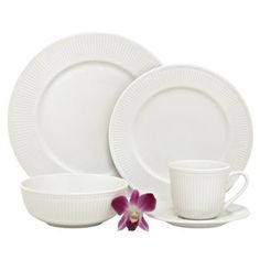 white dinnerware set with purple flower on the side