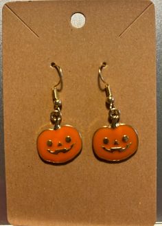 Cute little Jack-o'-lantern earrings made from charms Lantern Earrings, Halloween Earrings, Jack O, Jack O Lantern, Vancouver, Jewelry Earrings Dangle, Lanterns, Etsy Earrings, Dangle Drop Earrings