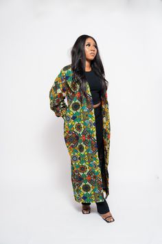 The Nnenna African print Ankara kimono is a must have, every lady deserves this stunner in her closet.  There are different beautiful ways to wear and style this kimono/jacket/dress. It can be worn as a kimono over a dress, it can also be worn over a trouser and top, skirt and top, over a jumpsuit and more. It can also be worn alone as a wrap dress when paired with a belt as seen in the picture.  It all depends on your mood, if you want a casual look, classy look, or even going out for an occasi Floral Print Kimono Sleeves Outerwear For Festival, Floral Kimono Sleeve Outerwear For Festivals, Festival Floral Print Outerwear With Kimono Sleeves, Multicolor Printed Outerwear With Kimono Sleeves, Patterned Long Sleeve Printed Kimono, Patterned Long Sleeve Kimono, Long Printed Traditional Kimono, Multicolor Printed Long Sleeve Kimono, Long Green Floral Print Kimono