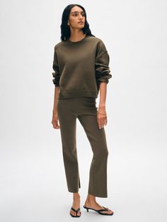 These double-knit cotton pants combine the comfort of sweats with the refinement of tailoring. An elastic waistband ensures comfortable all-day wear, while raised seams elongate the legs. Style it with the coordinating jacket on travel days, or dress it up with a collared shirt during the week. Details Inseam Length in size small is 27". The model is 5'9 1/2" and is wearing a size small. 79% Organic Cotton, 21% Lycra. Hand wash cold or dry clean. Do not twist or wring. Reshape and lay flat to dr Cashmere Travel Wrap, Dark Sage, Flare Pant, Kick Flares, Stylish Clothes For Women, Double Knit, Cardigan Top, Wrap Sweater, Sweater Sale