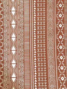 a brown and white pattern on fabric