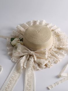 Elevate your summer style with this exquisite beige straw hat. This hat features a unique detachable flower decoration, allowing you to customize your look with ease. The elegant bowknot design adds a touch of sophistication. Crafted from high-quality straw, this hat offers excellent sun protection. The delicate lace trim adds a feminine touch, enhancing the hat's overall charm. Elegant Straw Hat For Spring Picnic, Elegant Spring Hats For Picnic, Elegant Summer Hat For Picnic, Spring Straw Boater Hat In Beige, Chic Bow Sun Hat For Summer, Chic Sun Hat With Bow For Summer, Chic Summer Sun Hat With Bow, Chic Cream Straw Boater Hat, Cream Straw Boater Hat For Kentucky Derby