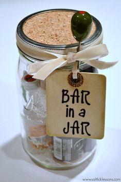 a jar filled with lots of different types of items and the words bah in a jar written on it