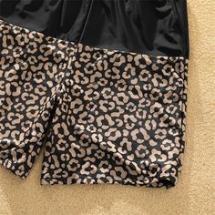 🐾 ELEVATE YOUR SUMMER STYLE WITH LEOPARD SPLICE SWIMWEAR SET! 🌞 Product Introduction: Dive into the season of sun and fun with our exclusive Leopard Splice Swim Trunks and One-Shoulder Tie Swimsuit Set. Crafted from high-quality POLYESTER, this fashion-forward swimwear ensemble is designed to make a statement at the beach or by the pool. Key Features: 👉 Please add each size separately to your shopping cart. 👉 Product Features: Embrace the wild side with our Leopard Splice design. 👉 Fabric C Patchwork Swimwear For Summer Beachwear, Patchwork Beachwear Swimwear For Summer, Summer Patchwork Swimwear For Beach, Summer Swimwear With Contrast Color, Patchwork Swimwear For Poolside, Patchwork Beachwear Swimwear For Poolside, Casual Black Color Block Swimwear, Contrast Color Summer Swimwear For Sunbathing, Summer Swimwear With Contrast Color For Sunbathing