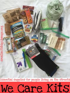 the contents of an emergency kit laid out on a bed with text that reads, we care kits