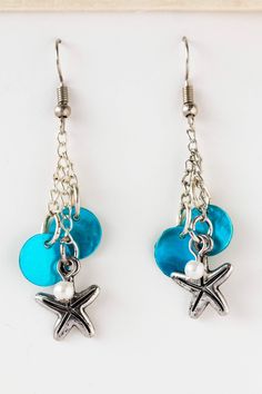 One of my personal favorite pairs of earrings to make and wear. These ocean inspired starfish and shell earrings are absolutely stunning. They're also incredibly light weight and move fluidly.  Made with silver starfish charms with dyed blue shell discs and a tiny pearl accent. At their longest point they are approximately 2in in length.  *Please note these earrings are made to order. Please allow for an extra day before they are shipped. Diy Earrings Tutorial, Chip Bead Jewelry, Beachy Jewelry, Starfish Earrings, Diy Jewelry Unique, Long Dangle Earrings