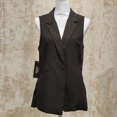 I Love This Dailylook Jackson Vest With Back Pleating! It Has Never Been Worn And Still Has The Tags Attached.This Vest Is The Perfect Professional Accessory For Any Wardrobe! Tailored Black V-neck Outerwear, Black Notch Lapel Vest For Fall, Casual Workwear Vest With Lapel Collar, Sleeveless Black Blazer For Spring, Trendy Fitted Vest For Workwear, Casual Tailored V-neck Outerwear, Black Tailored V-neck Outerwear, Fall Notch Lapel Vest, Casual V-neck Outerwear For Night Out