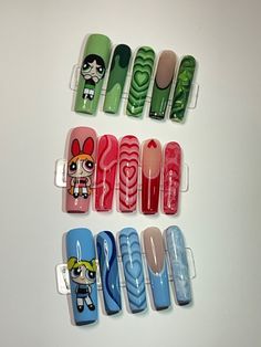 Blossom, Buttercup, and Bubbles Powerpuff nail art sets Powerpuff Inspired Nails, Buttercup Acrylic Nails, Blossom Powerpuff Nail Art, Powerpuff Nails Acrylic, Bubbles Powerpuff Nail Art, Buttercup Nail Art, Power Puff Nail Art, Blossom Nails Powerpuff, Bubbles Nails Powerpuff