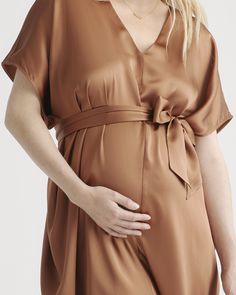 An elevated upgrade to basic maternity wear. This easy-to-wear silhouette is perfect for a date night or destination wedding. With a removable belt, there are multiple ways to wear it. This super flattering fit is made from 100% mulberry silk, in a satin finish. The best part…our silk is washable. Easy to style and easy to wash for low-maintenance luxe. Plus, silk fiber contains 18 kinds of amino acids that make it amazing for skin nourishment, hypo-allergenic, and naturally thermoregulating to Silk Maternity Dress, Maternity Overalls, 7 Months Pregnant, Silk Fiber, Silk Tee, Pre Pregnancy, Silk Tank, Silk Pajamas, Collar Blouse