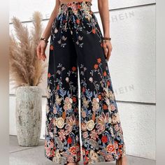 Elevate Your Wardrobe With These Stylish Black Wide-Leg Pants From Shein. The Pants Feature A Beautiful Floral Pattern That Adds A Touch Of Elegance To Your Outfit. The Pull-On Closure And Elastic Waist Make Them Comfortable To Wear, While The Lightweight Material Ensures You Stay Cool Throughout The Day. Perfect For Both Casual And Formal Occasions, These Dress Pants Are Made Of A Blend Of Polyester And Elastane, Making Them Durable And Easy To Maintain. The Pants Are Available In A Medium Size Casual Floral Print Wide Leg Pants, Casual Non-stretch Floral Print Wide Leg Pants, Floral Print Beach Bottoms, Bohemian Black Pants, Casual Multicolor Floral Print Wide Leg Pants, Casual High Waist Floral Wide Leg Pants, Multicolor High-waisted Wide Leg Pants With Floral Print, Multicolor High-waisted Floral Wide Leg Pants, Multicolor Floral Print High-waisted Wide Leg Pants