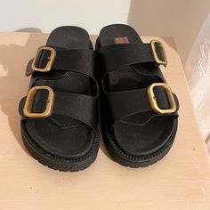 Black Gold Buckle Sandals. Size 6. Never Used! Black Sandals With Buckle Closure For Vacation, Trendy Black Platform Footbed Sandals, Black Platform Footbed Sandals For The Beach, Black Flat Sandals With Buckle Closure, Black Platform Slide Footbed Sandals, Black Slip-on Sandals With Buckle Closure, Black Platform Slip-on Footbed Sandals, Black Adjustable Platform Footbed Sandals, Adjustable Black Platform Footbed Sandals