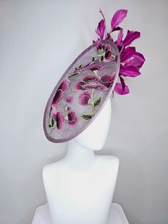 From the 2024 Featured Milliner of the Kentucky Derby Museum  Gorgeous Kentucky Derby hat fascinator  kentucky derby hat fascinator light purple lavender sinamay saucer w pink lavender purple green embroidered flowers,and purple feathers headband attachment.  each hat is totally one of a kind! no two are alike! *All hats are sold as displayed. No returns do to nature of product (headwear) Of course do not hesitate to contact me with any issues :) Check out my The Hat Doctor amazing news story fe Purple Headpieces For Spring Races, Purple Kentucky Derby Fascinator For Races, Purple Fascinator For Kentucky Derby Races, Purple Fascinator For Kentucky Derby Garden Party, Purple Fascinator For Royal Ascot Garden Party, Purple Spring Hat Headpiece, Purple Mini Hats For Spring Races, Purple Fitted Fascinator For Spring, Fitted Purple Fascinator For Spring