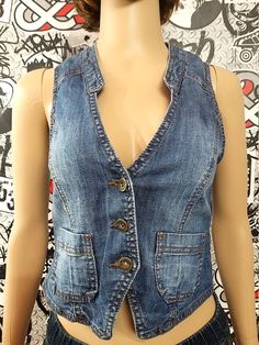 womens denim Vest Vintage BLUE denim Top BLUE jeans Top jeans Vest Striped denim womens Vest waistcoats Retro Vest jeans Vest cotton Vest S98 % COTTONheight of the woman in the photo - 180 cmPlease refer to photos for details of condition. Condition: used, signs of age and wear see picturesMeasurements:Length: 46 cm/ 18.1 "Bust: 82 cm/ 32.3"Waist: 78 cm/30.7 "Tag Size: EUR-36noteThe color on the pictures may vary due to monitor settings and light reflections.Ready to shipPlease do not hesitate t Dark Wash Denim Vest Jacket, Medium Wash Denim Vest With Pockets, Medium Wash Denim Vest Top, Light Wash Denim Vest Top, Trendy Denim Blue Vest With Pockets, Trendy Medium Wash Denim Vest, Washed Blue Denim Vest With Pockets, Light Wash Denim Vest With Pockets, Fitted Light Wash Denim Vest