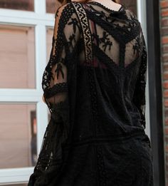 This gorgeous romantic Bohemian-Vintage Inspired look is such a Beautiful, timeless and charm addition to any occasion! One Size Plus Size( will fit up to 4X ) Vintage Inspired OVERSIZED cardigan kimono Duster 50% Nylon 50% Viscose Colors may vary from different viewing devices Loose Fitting-Oversized-Runs Large Length 45/46" ***Jewelry and Slip sold separately Black Summer Party Kimono, Bohemian Long Sleeve Kimono For Evening, Bohemian Long Sleeve Evening Kimono, Black Kimono For Festival, Vintage Black Kimono For Spring, Black V-neck Kimono For Festival, Black Festival Dress With Kimono Sleeves, Black Kimono Sleeve Festival Dress, Black Dress With Kimono Sleeves For Festival