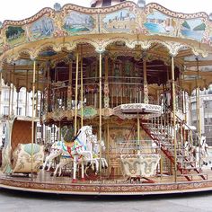 an old fashioned merry go round on the street