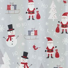 a christmas themed shower curtain with santa claus and snowmen in the background on grey