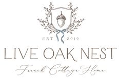 the logo for live oak nest, a french cottage home in new york's east end