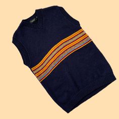 Vintage Y2K 00's Unisex Navy Blue Yellow Striped Dark Academia Preppy Skater Knit Sweater Vest Size M/L Condition: 9/10 Size: feels like M/L Model is size UK6-8/EU34/S and is 164 cm tall (5.4ft) The item is preloved/vintage so some signs of natural wear and age might appear ✨ Blue Knit Vest For Fall, Casual Navy Wool Top, Casual Multicolor Sweater Vest For Winter, Navy Cotton Sweater Vest For Winter, Retro Crew Neck Sweater Vest For Fall, Retro Sleeveless Sweater For Winter, Retro Sleeveless Winter Sweater, Navy Wool Winter Tops, Casual Sleeveless Wool Sweater