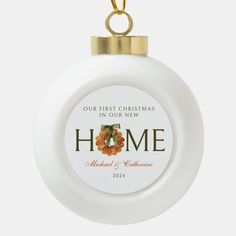 a white ornament with the words home on it