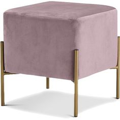 a pink velvet ottoman with gold legs