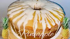 a pineapple bundt cake with icing and two pineapples